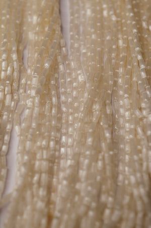 Ivory Hollow-Blown Glass Antique Beads
