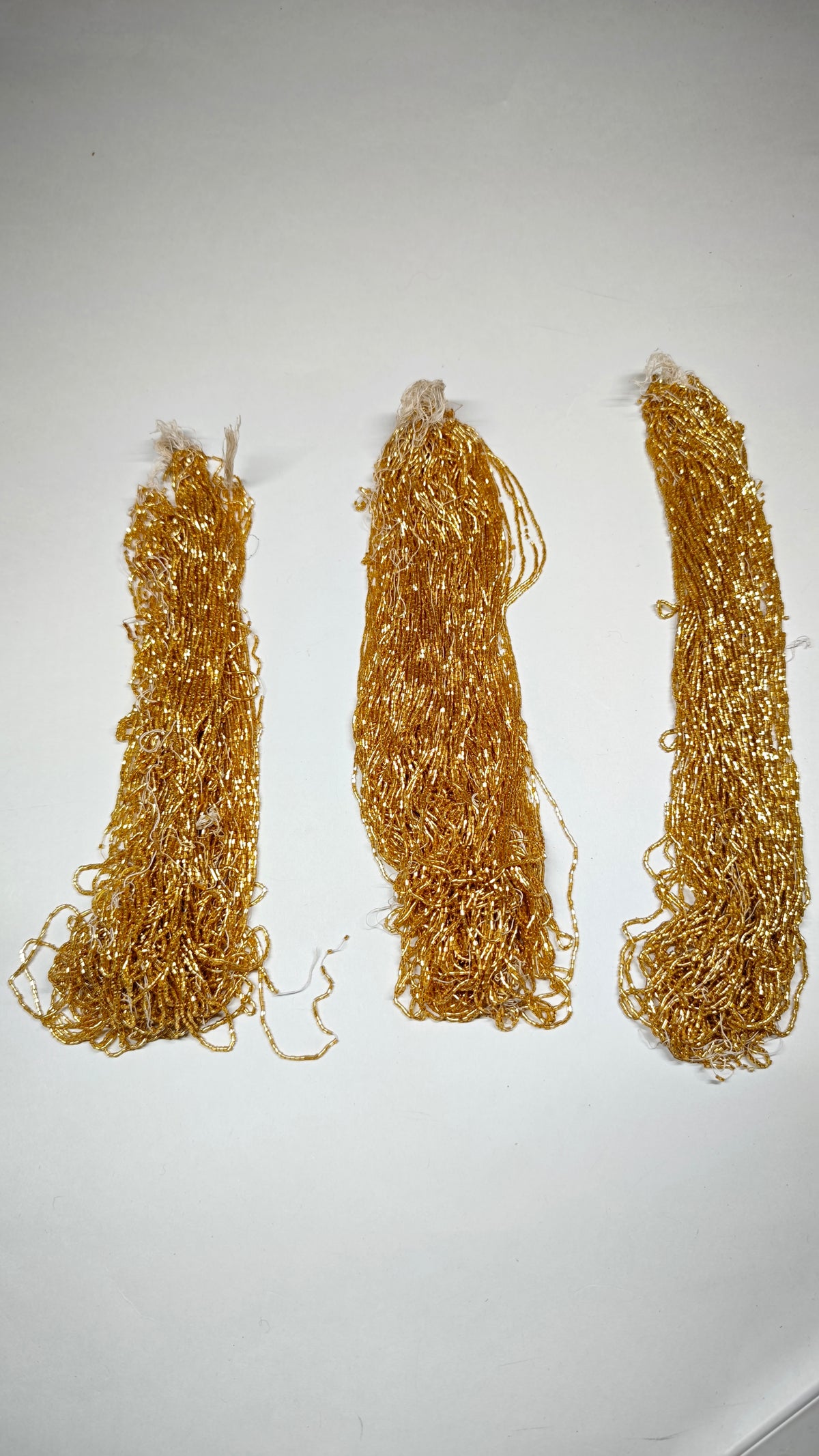 Vintage gold silver-lined glass tubes, Norman Hartnell archive