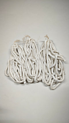 Three hanks of 5mm matte white cuvettes and sequins, Norman Hartnell archive