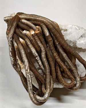 5mm white gold satin cuvettes, Norman Hartnell archive