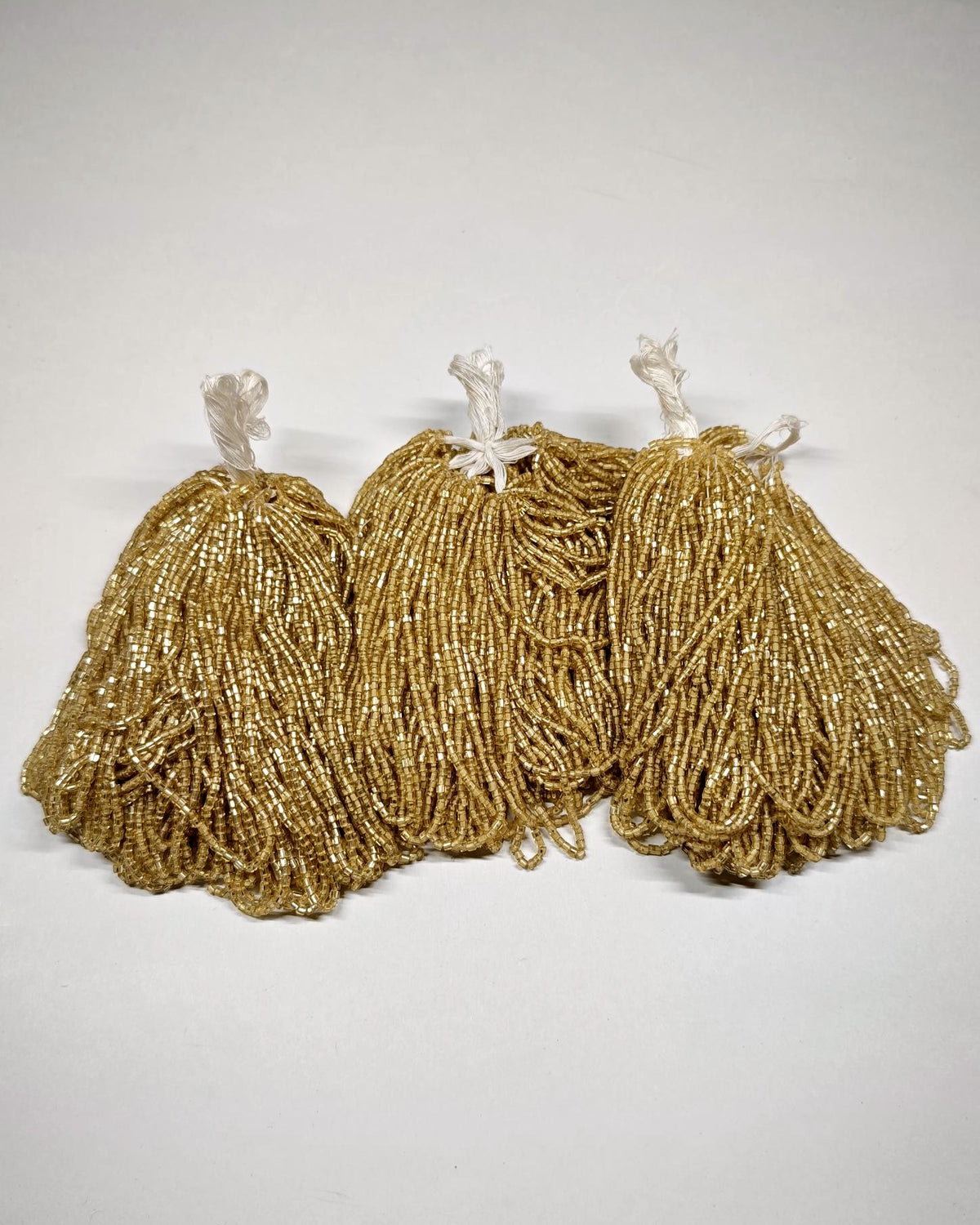Pale gold silver-lined vintage Czech glass tubes, mini hanks
