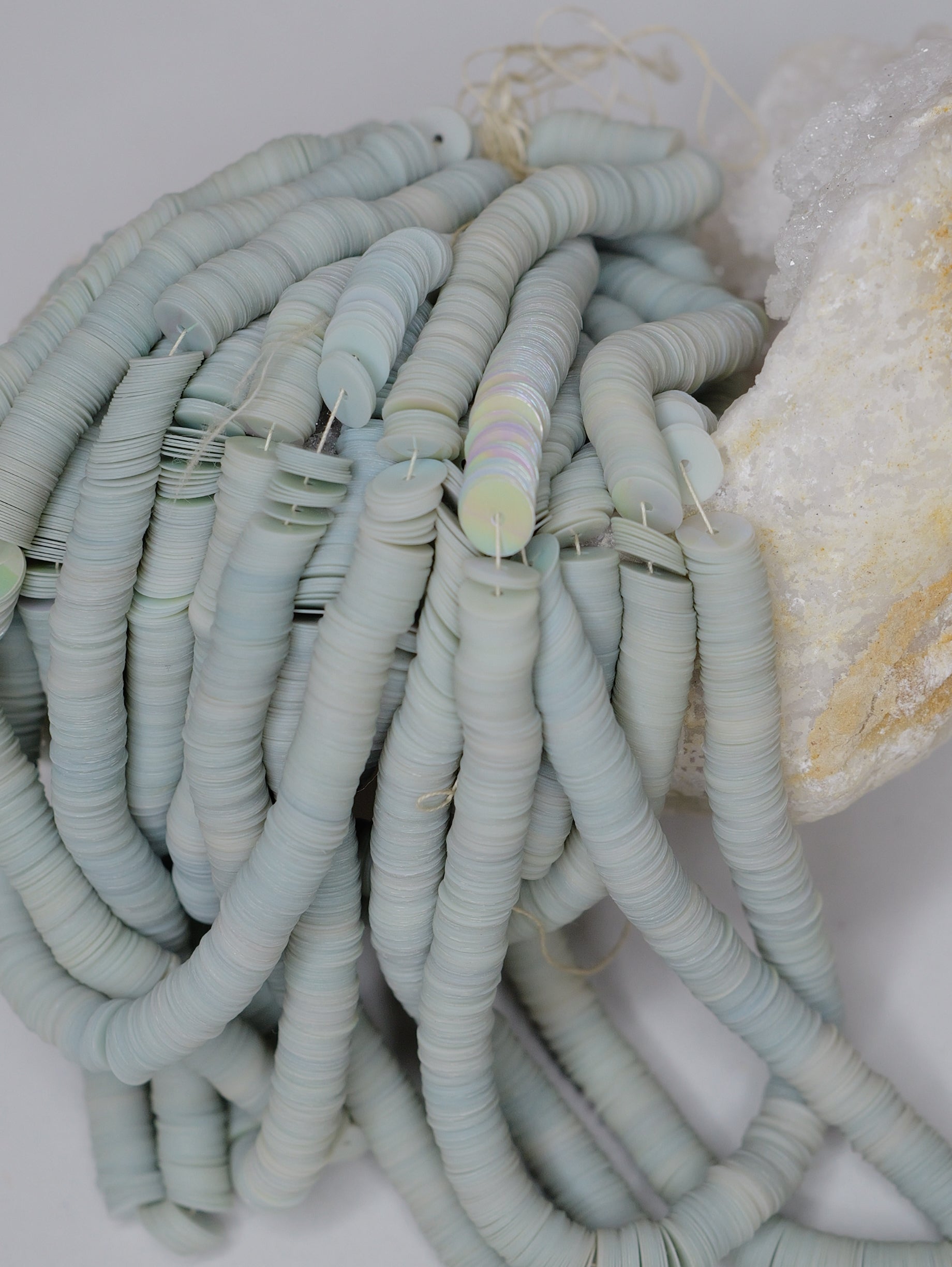 6mm Mist Blue Matt Iris Sequins - Norman Hartnell Archive