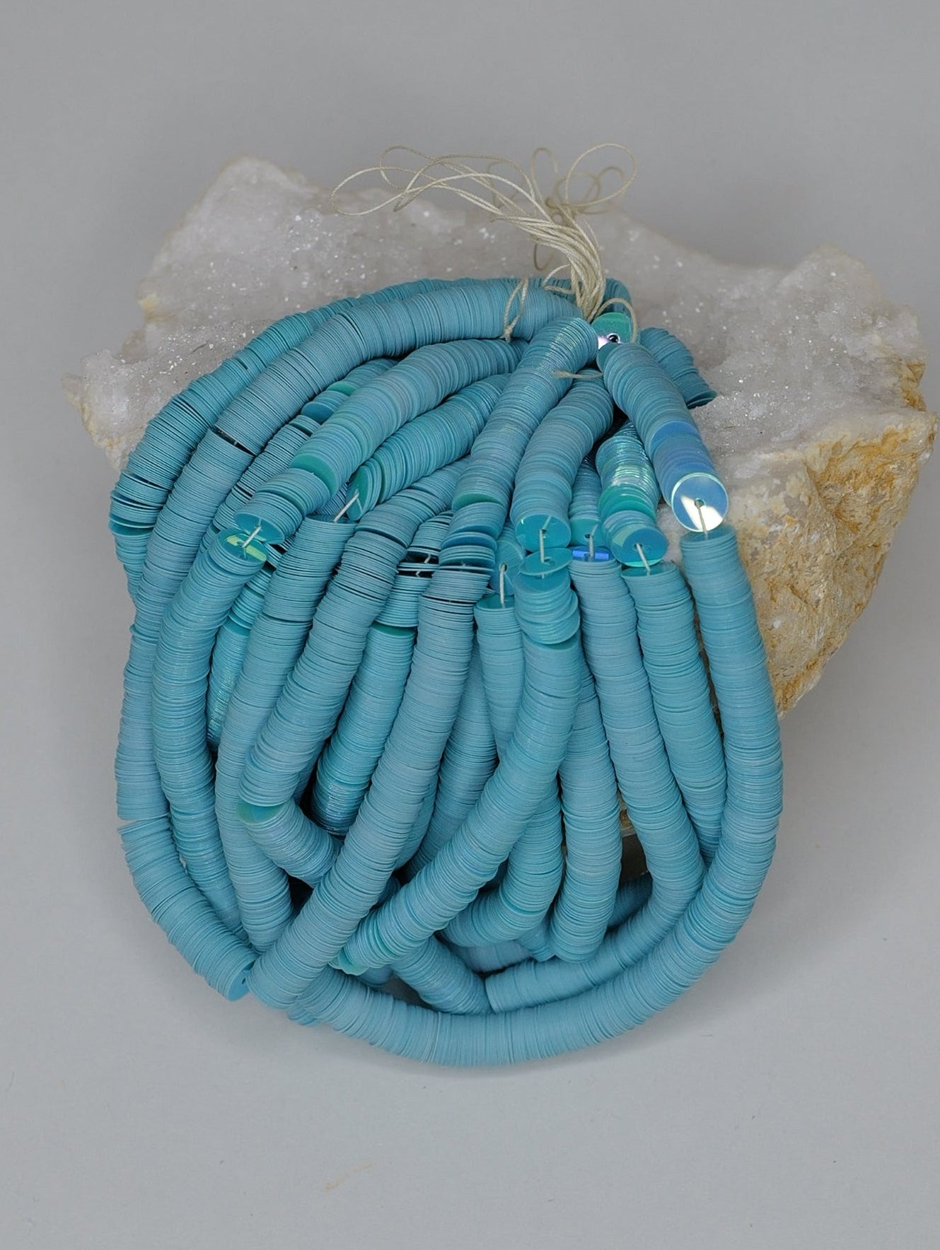6mm Turquoise Blue Iris Sequins - Norman Hartnell Archive