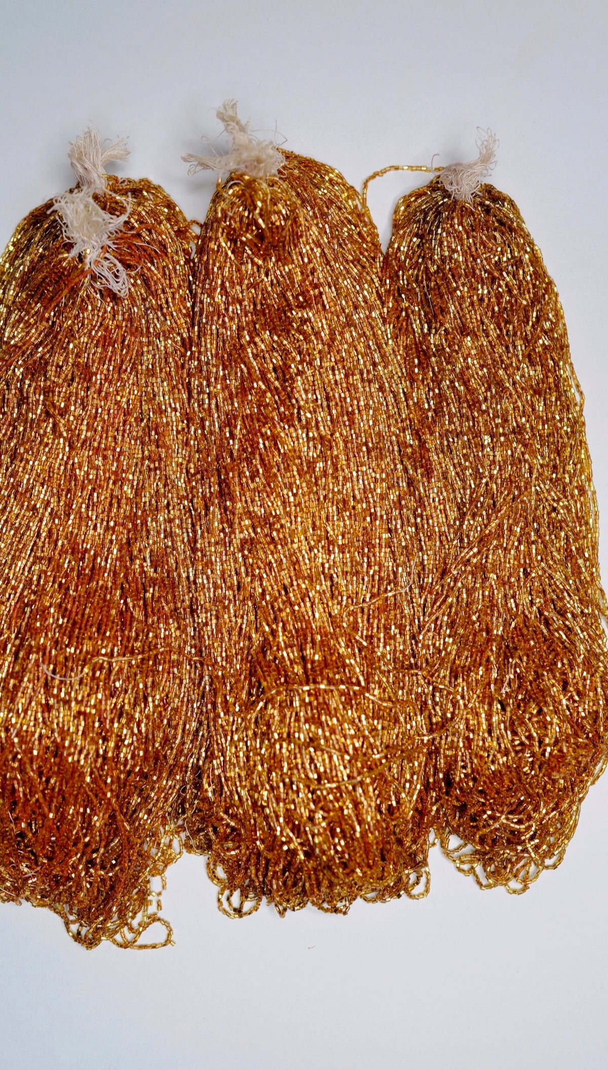 Copper Gold Beads - Norman Hartnell Archive