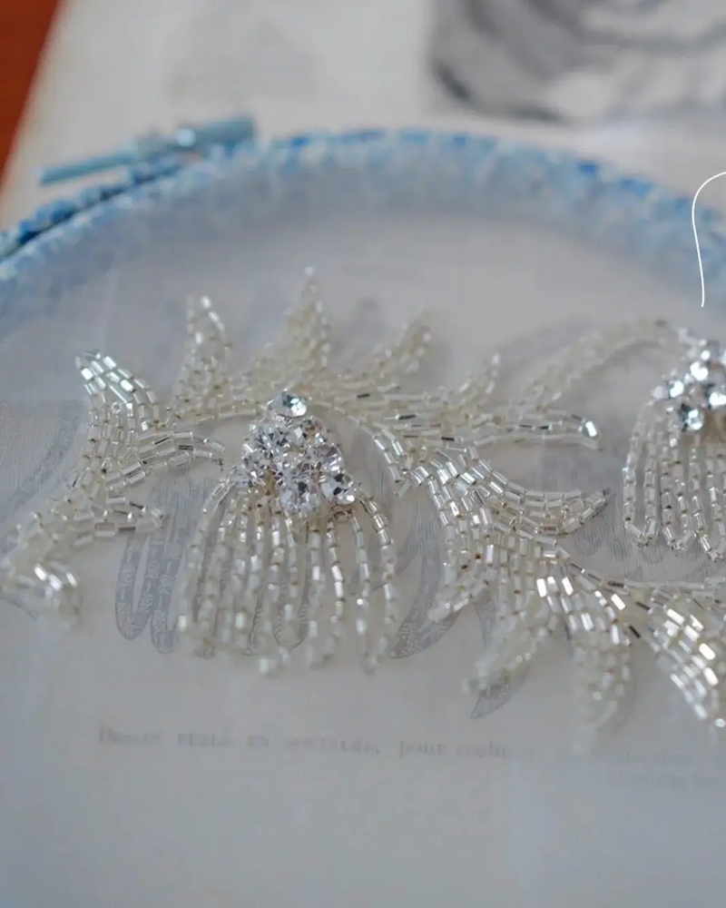 Silver design: silver beads and crystals on organza